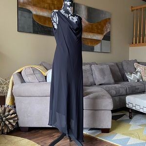 Beautiful black crepe fully lined evening dress.